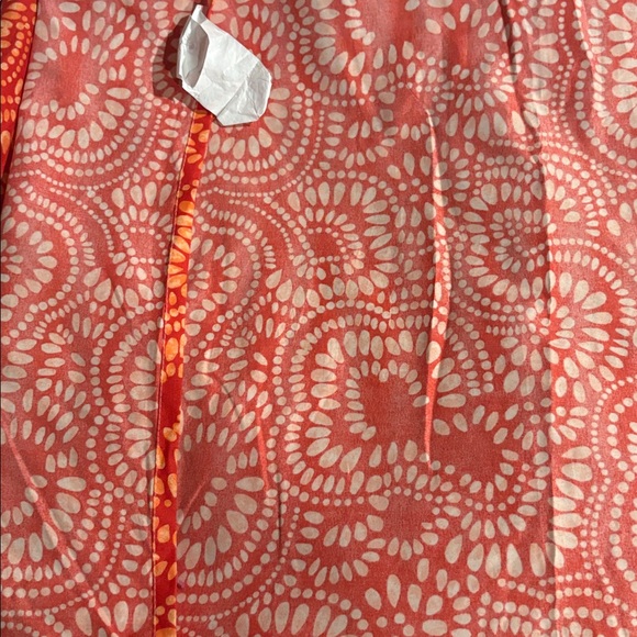 Reversible quilted pillow sham with a teal, red, and orange paisley print - Picture 7 of 9